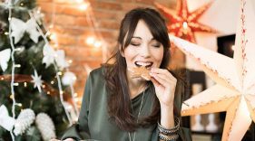 Woman snacks on a cookie