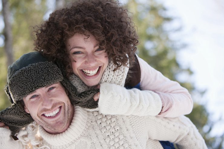 Enthusiastic couple piggybacking