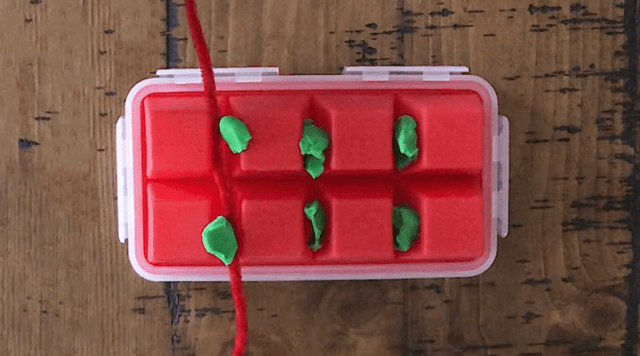 This project uses an ice tray, Play-Doh, and pipe cleaners to illustrate the importance of flossing! Teaching kids to floss just got a whole lot easier.